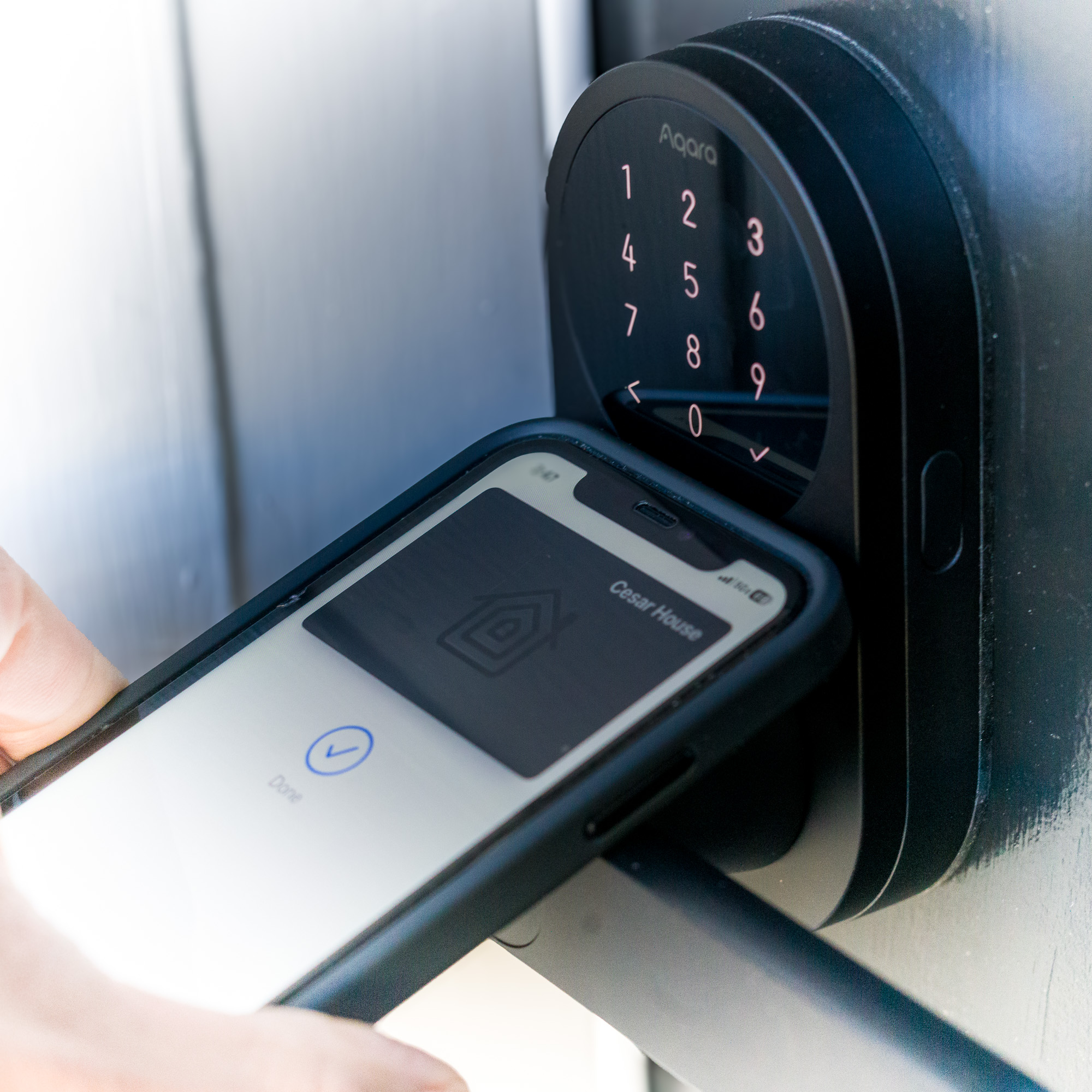 Smartphone showing the building&rsquo;s keyless entry app
